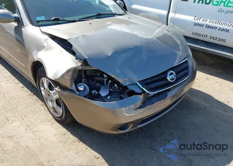 2002 Nissan Altima 2.5 S z USA, uszkodzony, nr VIN 1N4AL11D02C211175